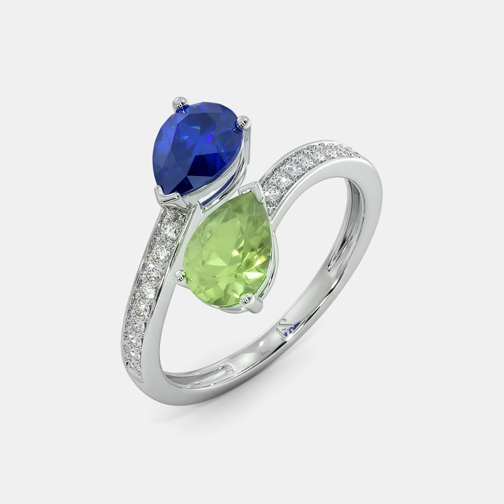 Peridot and 2025 blue sapphire ring
